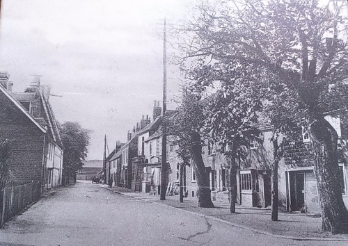 Old postcard showing High Street