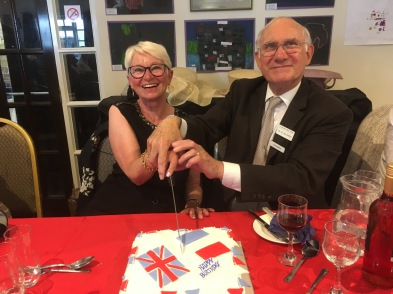 Chairman Mike Gallagher cutting the Union Jack cake